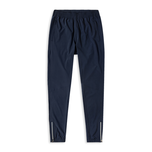 Run Jogger Navy front with Elastic Waistband, Zippered Side Pockets, Zipper at ankles, and Reflective strip at side seam/bottom hem